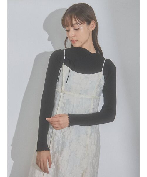 merry jenny(メリージェニー)の「ribbonラップニットtops(ニット/セーター・レディース・アイボリー/ブラック/ブルー・FREE)」の1枚目の写真
