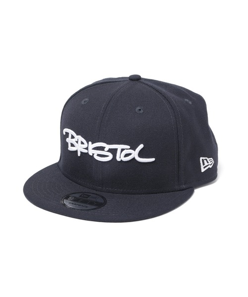 F.C.Real Bristol(エフシーレアルブリストル)の「NEW ERA TAGGING 9FIFTY SNAPBACK CAP(キャップ・メンズ・ブラック/ネイビー・FREE)」の1枚目の写真
