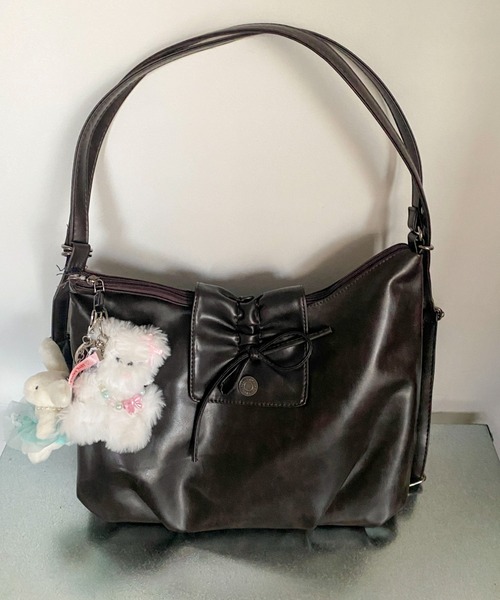 Mejoul（メジュール）の「【累計販売数8200点！／お気に入り33000突破★】【大容量A4サイズ対応】2WAYフェイクレザーリボン リュック ショルダートート（ショルダーバッグ・レディース・ブラウン/ブラック/キャメル・F）」の10枚目の写真