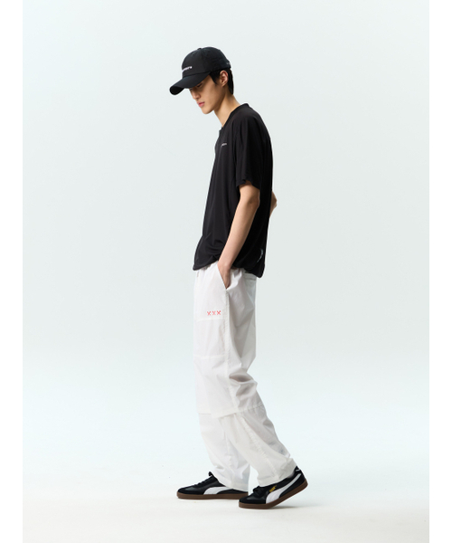 JAMIE WEST(ジェイミーウエスト)の「JWロゴパフォーマンスヘンリーネックカラティシャツ(ブラック)(Tシャツ/カットソー・レディース・その他・MEDIUM/LARGE/X-LARGE)」の4枚目の写真
