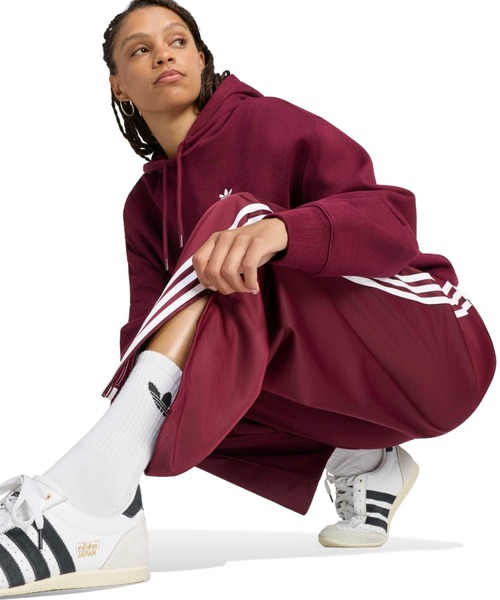 adidas(アディダス)の「adidas FIREBIRD BARREL TRACK PANTS / アディダス ファイヤーバード バレル トラックパンツ(その他パンツ・レディース・バーガンディー・S/L/M)」の2枚目の写真