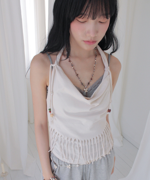 RUBATI（ルバティ）の「アニタ・ロ フリンジカウルホルターネックノースリーブビーズトップ_エクリュ（Tシャツ/カットソー・レディース・その他・1/2）」の2枚目の写真