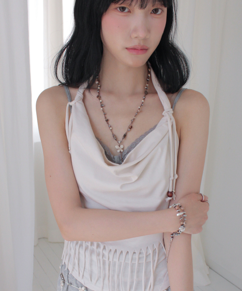 RUBATI（ルバティ）の「アニタ・ロ フリンジカウルホルターネックノースリーブビーズトップ_エクリュ（Tシャツ/カットソー・レディース・その他・1/2）」の3枚目の写真