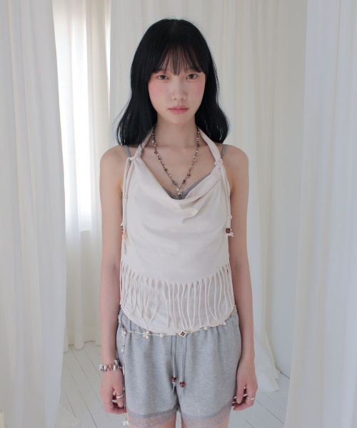 RUBATI（ルバティ）の「アニタ・ロ フリンジカウルホルターネックノースリーブビーズトップ_エクリュ（Tシャツ/カットソー・レディース・その他・1/2）」の5枚目の写真