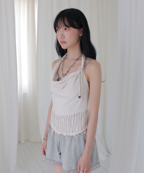 RUBATI（ルバティ）の「アニタ・ロ フリンジカウルホルターネックノースリーブビーズトップ_エクリュ（Tシャツ/カットソー・レディース・その他・1/2）」の6枚目の写真