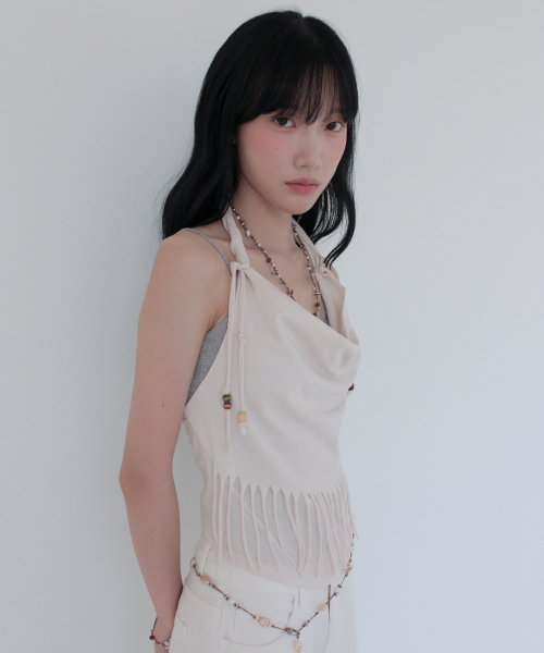 RUBATI（ルバティ）の「アニタ・ロ フリンジカウルホルターネックノースリーブビーズトップ_エクリュ（Tシャツ/カットソー・レディース・その他・1/2）」の8枚目の写真