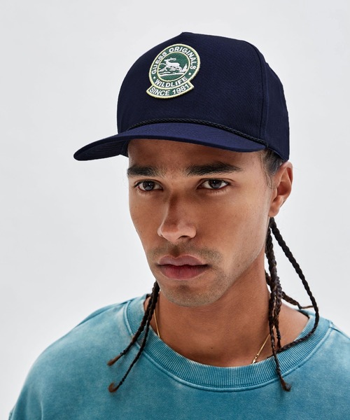 Guess(ゲス)の「GUESS Originals Wildlife Patched Cap(キャップ・メンズ・ネイビー・ONE SIZE)」の1枚目の写真