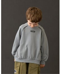 b・ROOM（ビールーム）の「【MNCM】【毛玉バイバイ裏毛裏起毛】ラグランパイピングビッグスウェット（スウェット・キッズ）」