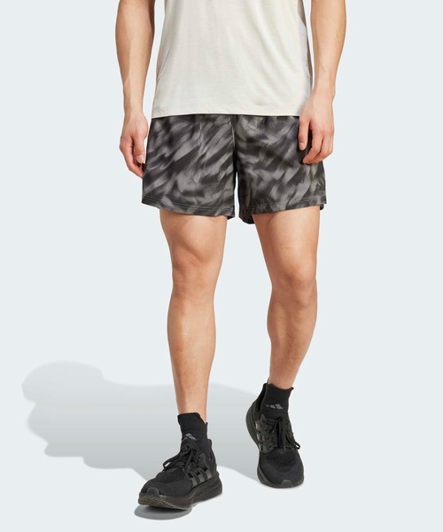 adidas(アディダス)の「オウン ザ ラン 総柄プリント ショーツ / ハーフパンツ / アディダス adidas(その他パンツ・メンズ・グレー・L(5inch)/L(7inch)/M(7inch)/S(5inch)/XS(5inch)/XS(7inch)/XXS/2XL(7inch)/XXXL)」の1枚目の写真