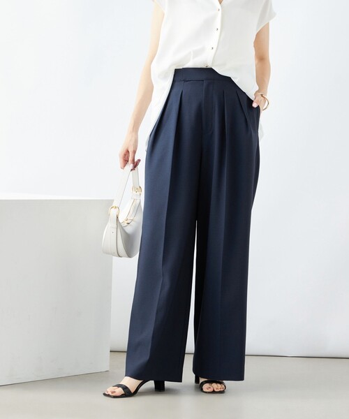 NOLLEY’S（ノーリーズ）の「《セットアップ対応》ウォッシャブルサッカーストライプパンツ（その他パンツ・レディース・ネイビー/ブルー系その他3/オフホワイト・38/36）」の2枚目の写真