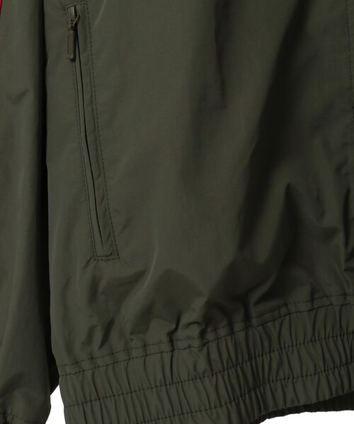 CONVERSE TOKYO（コンバーストウキョウ）の「SIDE LINE NYLON TRACK JACKET(UNISEX)（ミリタリージャケット・レディース・ブラック/チャコールグレー/ライトグレー/カーキ・SMALL/MEDIUM）」の5枚目の写真