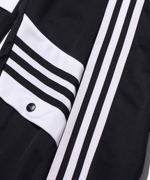 アディダス　ワイドパンツ　ダニエルカタリS adidas（アディダス）の「ダニエル カタリ トラックパンツ