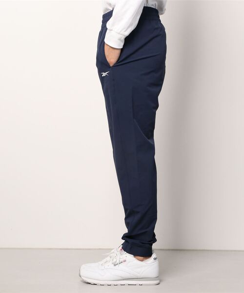 Reebok(リーボック)の「パフォーマンス ウーブンパンツ / Performance Woven Pants(スウェットパンツ・メンズ・ブラック/ネイビー・SMALL/MEDIUM/LARGE/X-LARGE/XX-LARGE/X-SMALL/XXX-LARGE)」の3枚目の写真