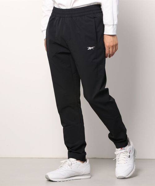 Reebok(リーボック)の「パフォーマンス ウーブンパンツ / Performance Woven Pants(スウェットパンツ・メンズ・ブラック/ネイビー・SMALL/MEDIUM/LARGE/X-LARGE/XX-LARGE/X-SMALL/XXX-LARGE)」の4枚目の写真