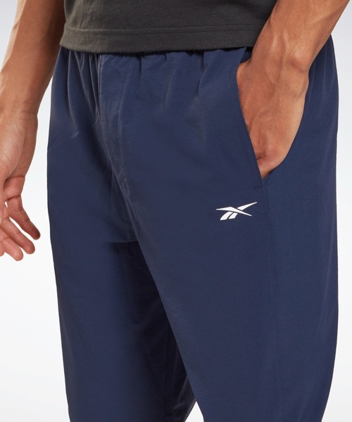 Reebok(リーボック)の「パフォーマンス ウーブンパンツ / Performance Woven Pants(スウェットパンツ・メンズ・ブラック/ネイビー・SMALL/MEDIUM/LARGE/X-LARGE/XX-LARGE/X-SMALL/XXX-LARGE)」の13枚目の写真