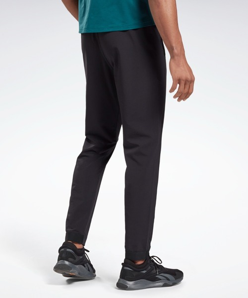 Reebok(リーボック)の「パフォーマンス ウーブンパンツ / Performance Woven Pants(スウェットパンツ・メンズ・ブラック/ネイビー・SMALL/MEDIUM/LARGE/X-LARGE/XX-LARGE/X-SMALL/XXX-LARGE)」の10枚目の写真