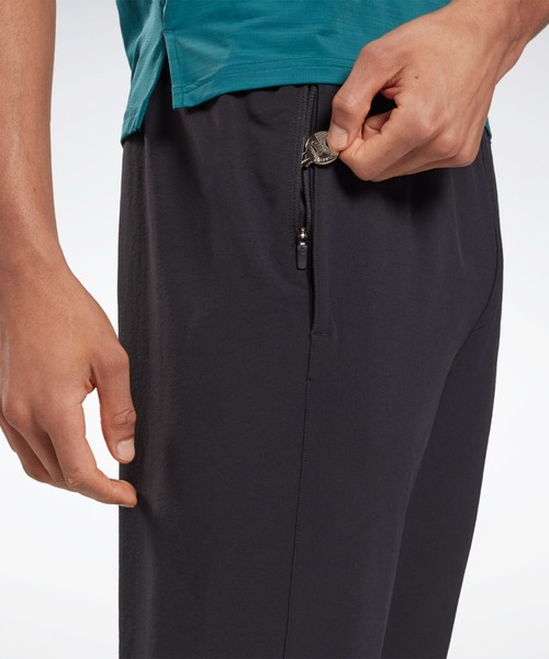 Reebok(リーボック)の「パフォーマンス ウーブンパンツ / Performance Woven Pants(スウェットパンツ・メンズ・ブラック/ネイビー・SMALL/MEDIUM/LARGE/X-LARGE/XX-LARGE/X-SMALL/XXX-LARGE)」の9枚目の写真