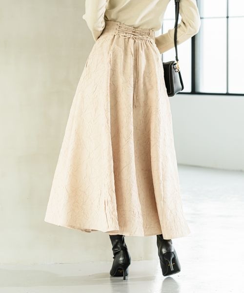 Andemiu(アンデミュウ)の「ワッシャーレースアップフレアスカート 100551(スカート・レディース・ホワイト/ベージュ/ブラック・FREE)」の1枚目の写真