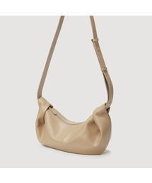 Flor（フロル）の「Ohwi Sling Bag Taupe（メッセンジャーバッグ）」