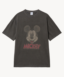 VTWO（ブイツー）の「ヴィンテージピグメントダメージウォッシングフェイス_ミッキー_ Tシャツ (ブラック)（Tシャツ/カットソー）」