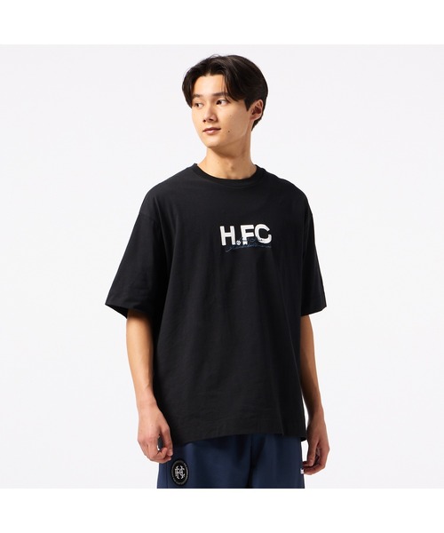 hummel（ヒュンメル）の「hummel/ヒュンメル H.FC ﾛｺﾞTｼｬﾂ（Tシャツ/カットソー・レディース・ブルー/ブラック/ホワイト・L/XL/M）」の3枚目の写真