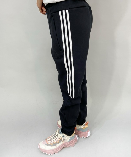 adidas（アディダス）の「adidas/アディダス  ルーズシルエット  スリーストライプスジャージパンツ   49220（その他パンツ・レディース・ブラック×ホワイト/ブラック・L/S/M）」の5枚目の写真