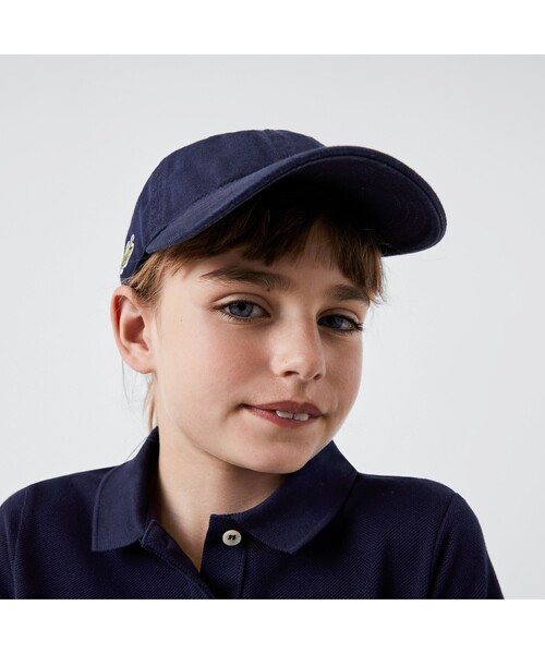 LACOSTE（ラコステ）の「KIDSバックブランドネームロゴコットンキャップ（キャップ・キッズ・ホワイト/ネイビー/レッド・M/L）」の2枚目の写真