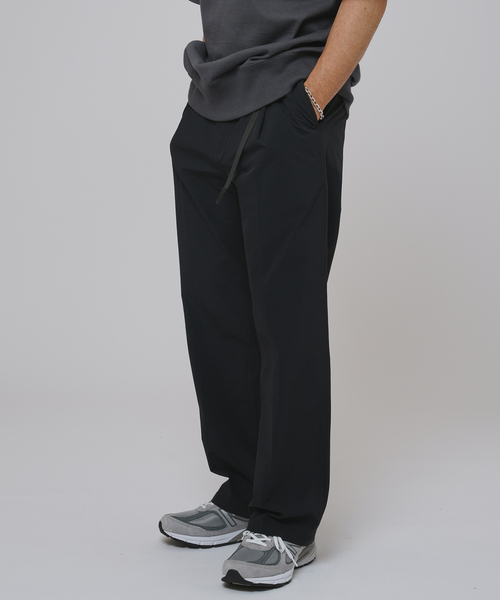 Gramicci(グラミチ)の「GRAMICCI(グラミチ) 別注 4WAY ストレッチ 1タック セミワイドパンツ(その他パンツ・メンズ・チャコールグレー/ブラック・X-LARGE/LARGE/MEDIUM/SMALL)」の7枚目の写真
