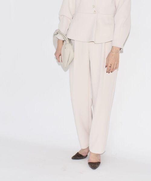 kaene(カエン)の「kaene:パールモチーフボタンテーパードパンツ◆(その他パンツ・レディース・ブラック/ベージュ・ONE SIZE)」の1枚目の写真