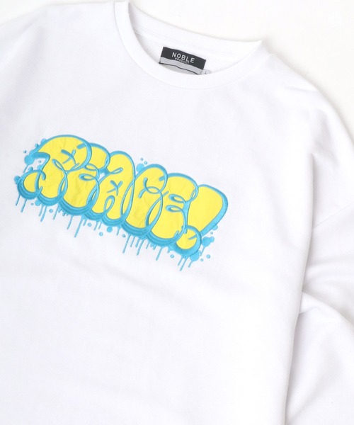 Lazar(ラザル)の「Graffiti Logo オーバーサイズ グラフィティ タギングロゴ ワッペン刺繍 スウェット レディース メンズ トレーナー(スウェット・メンズ・ホワイト/ブラック/イエロー/グリーン/ホワイト系その他/ブラック系その他・M/L)」の2枚目の写真