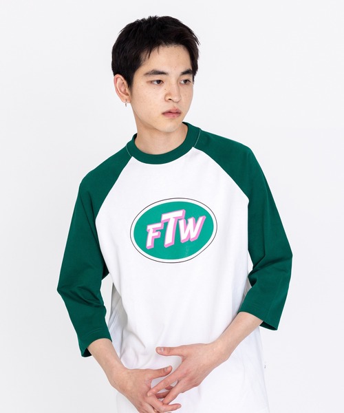 FTW(エフティダブリュー)の「FTW CIRCLE LOGO RAGLAN TEE(Tシャツ/カットソー・メンズ・ブラック/グリーン/ネイビー・MEDIUM/LARGE)」の1枚目の写真