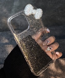 Vini（ヴィニ）の「キラキラ リボン ラメ入り クリア iPhone ケース 13.13Pro.14.15.15Pro.16.16Pro（スマホケース/カバー）」