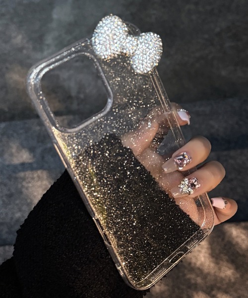 Vini(ヴィニ)の「キラキラ リボン ラメ入り クリア iPhone ケース 13.13Pro.14.15.15Pro.16.16Pro.17(スマホケース/カバー・レディース・シルバー/ブラック・iPhone 13/iPhone 13 Pro/iPhone 14/iPhone 15/iPhone 15 Pro/iPhone 16/iPhone 16 Pro)」の2枚目の写真