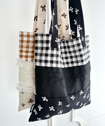 Loueme（ルエム）の「リボンギンガムチェックパターンフリルトート（トートバッグ）」