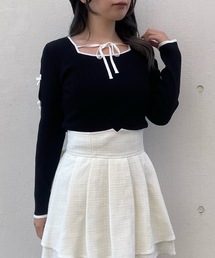 abc une face（アーベーセーアンフェイス）の「スリットリボンスリーブトップス（ニット/セーター）」