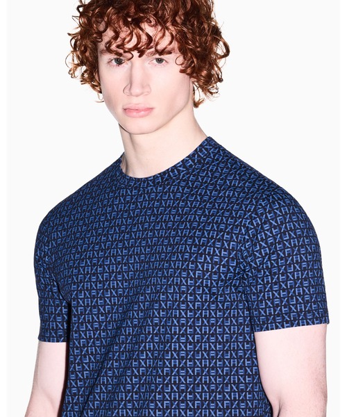 ARMANI EXCHANGE(アルマーニエクスチェンジ)の「【A|X アルマーニ エクスチェンジ】オールオーバースクエアロゴ 半袖クルーネックTシャツ/REGULAR(Tシャツ/カットソー・メンズ・ネイビー/アイボリー・X-LARGE/SMALL/MEDIUM/LARGE/XX-LARGE/X-SMALL)」の1枚目の写真