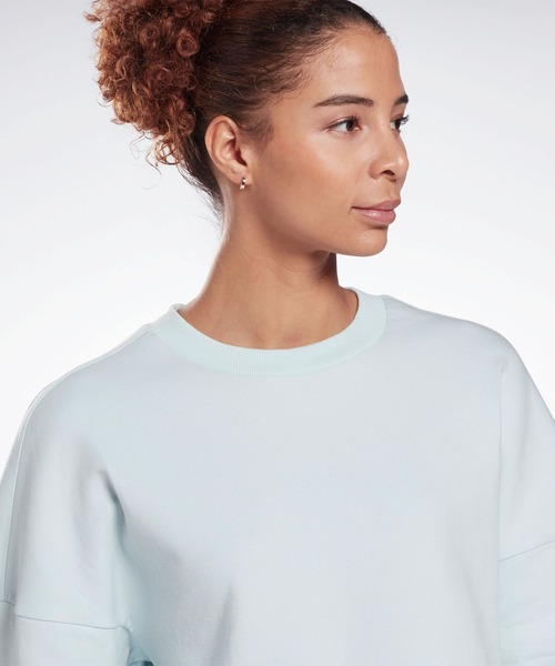 Reebok(リーボック)の「DreamBlend コットンミッドレイヤー スウェットシャツ / DreamBlend Cotton Midlayer Sweatshirt(スウェット・レディース・ライトブルー・SMALL/MEDIUM/LARGE/X-LARGE/X-SMALL)」の6枚目の写真