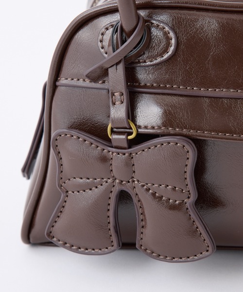 one after another NICE CLAUP(ワンアフターアナザーナイスクラップ)の「リボンチャーム付きボストンバッグ(ボストンバッグ・レディース・ダークブラウン/アイボリー/イエロー・FREE)」の9枚目の写真