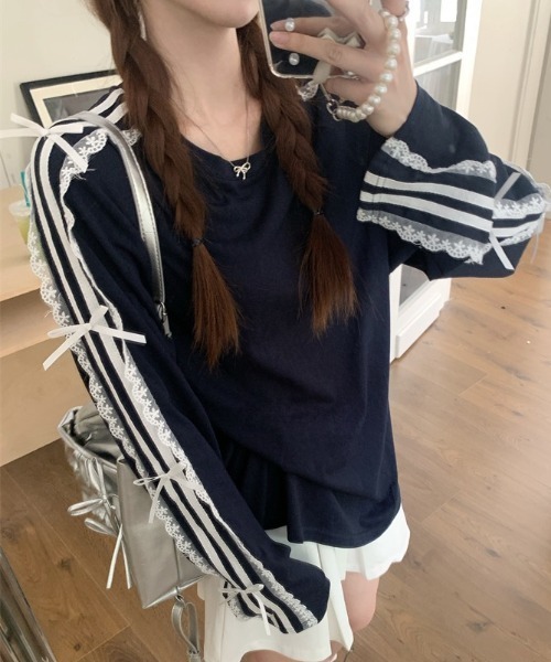 AVYL(アヴィル)の「袖ラインフリルリボンルーズスウェット(Tシャツ/カットソー・レディース・ネイビー・M)」の1枚目の写真