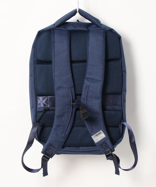 UNSTANDARD(アンスタンダード)の「UNSTANDARD アンスタンダード 【SILAS×UNSTANDARD】SQUARE BACKPACK(バックパック/リュック・メンズ・ネイビー・FREE)」の5枚目の写真