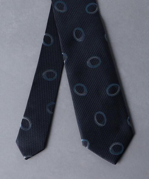【新品、未使用】Holiday & Brown オーバル柄ジャカードネクタイ Holliday & Brown（ホリデーアンドブラウン）の「Holliday