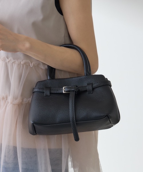 &. NOSTALGIA(アンドドットノスタルジア)の「【ZOZO限定】ベルトミニハンドバッグ(ハンドバッグ・レディース・ブラック/アイボリー・FREE)」の1枚目の写真