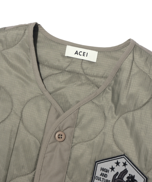 ACEI（アセイ）の「ワッペンキルティングリビングジャケット [UNI] ブラック（ナイロンジャケット・メンズ・ベージュ・MEDIUM/LARGE/X-LARGE/XX-LARGE）」の3枚目の写真