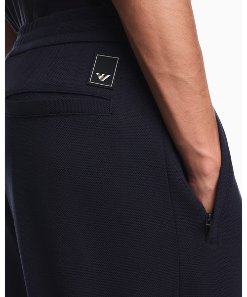 EMPORIO ARMANI(エンポリオアルマーニ)の「【エンポリオ アルマーニ】レギュラーフィット ジャージーパンツ TRAVEL ESSENTIAL(スウェットパンツ・メンズ・ネイビー/キナリ・X-SMALL/X-LARGE/SMALL/MEDIUM/LARGE)」の9枚目の写真