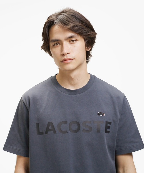 LACOSTE(ラコステ)の「ヘビーウェイトブランドネーム ラバープリント ロゴ半袖Tシャツ(Tシャツ/カットソー・メンズ・ブラック/ネイビー/オフホワイト/グレー/ダークブルー/キナリ/ダークアッシュ・5/2/4/3)」の1枚目の写真