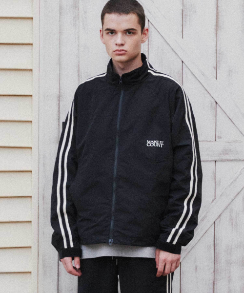WMC(ダブリューエムシー)の「サイドラインジャンパー_BLACK(ナイロンジャケット・レディース・ブラック・MEDIUM/LARGE/X-LARGE)」の1枚目の写真