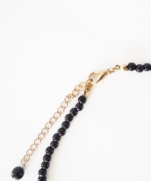 Casselini（キャセリーニ）の「Casselini(キャセリーニ)リボンビーズネックレス（ネックレス・レディース・ブラック/ホワイト・FREE）」の8枚目の写真