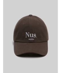 HUKE（ヒューク）の「Nus. Sand ball cap (Brown)（キャップ）」