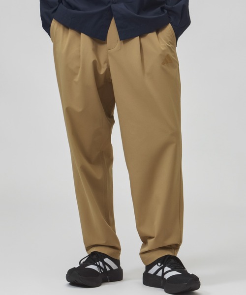 adidas(アディダス)の「【別注】アディダス adidas M LUXA スラックス AP 限定コラボ(スラックス・メンズ・ベージュ/ブラック・L/M/S/3L/LL)」の1枚目の写真