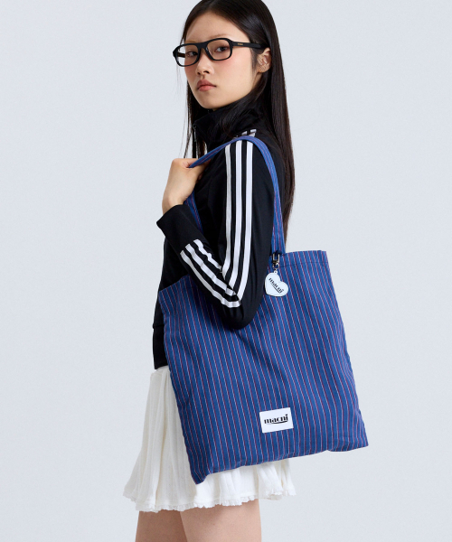 MACNI(マクニ)の「HEART STRIPE ECO BAG BLUE(エコバッグ/サブバッグ・レディース・その他・FREE)」の3枚目の写真
